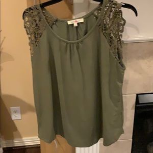 Green top with short lace sleeves